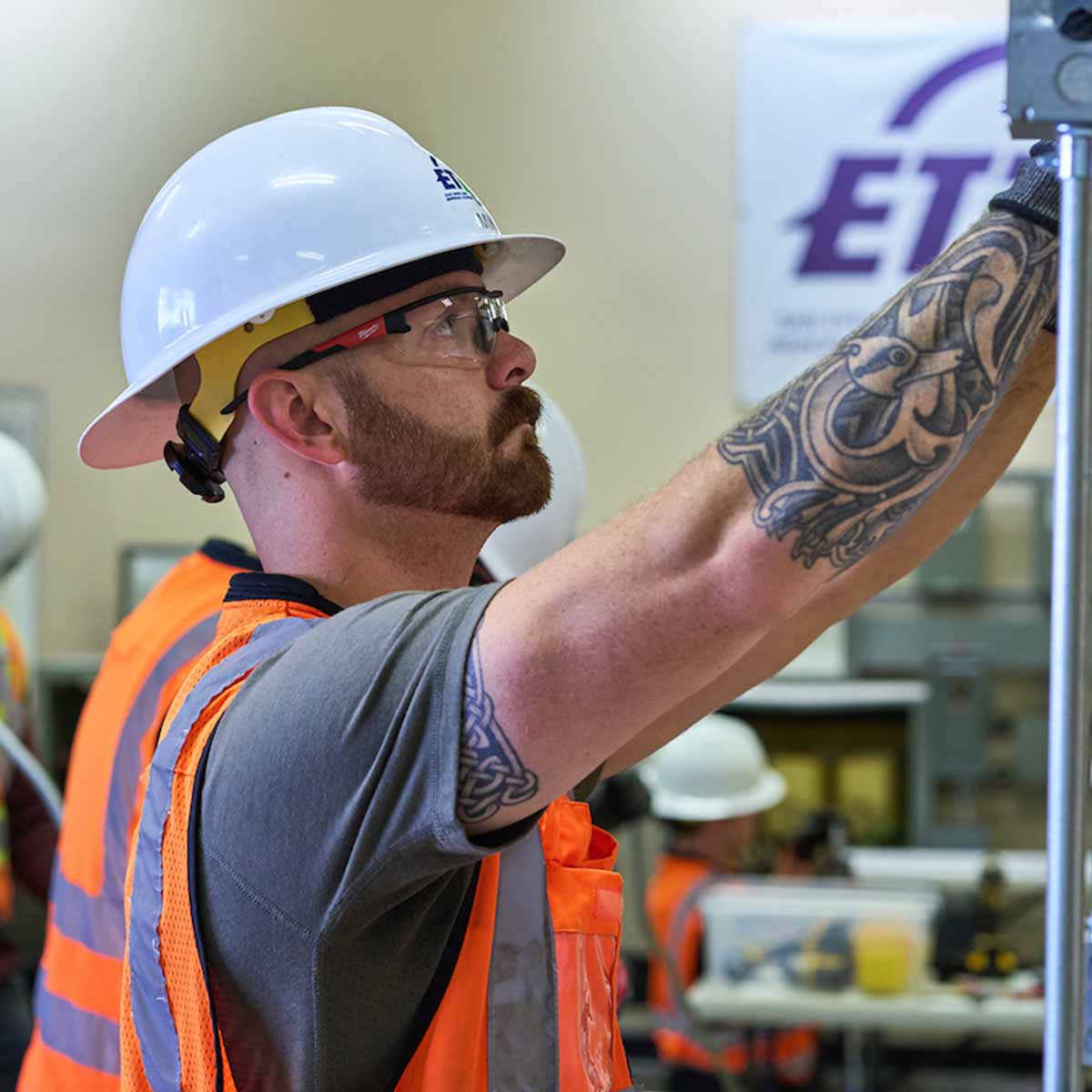 Electrician Trainee learning in a shop calss.